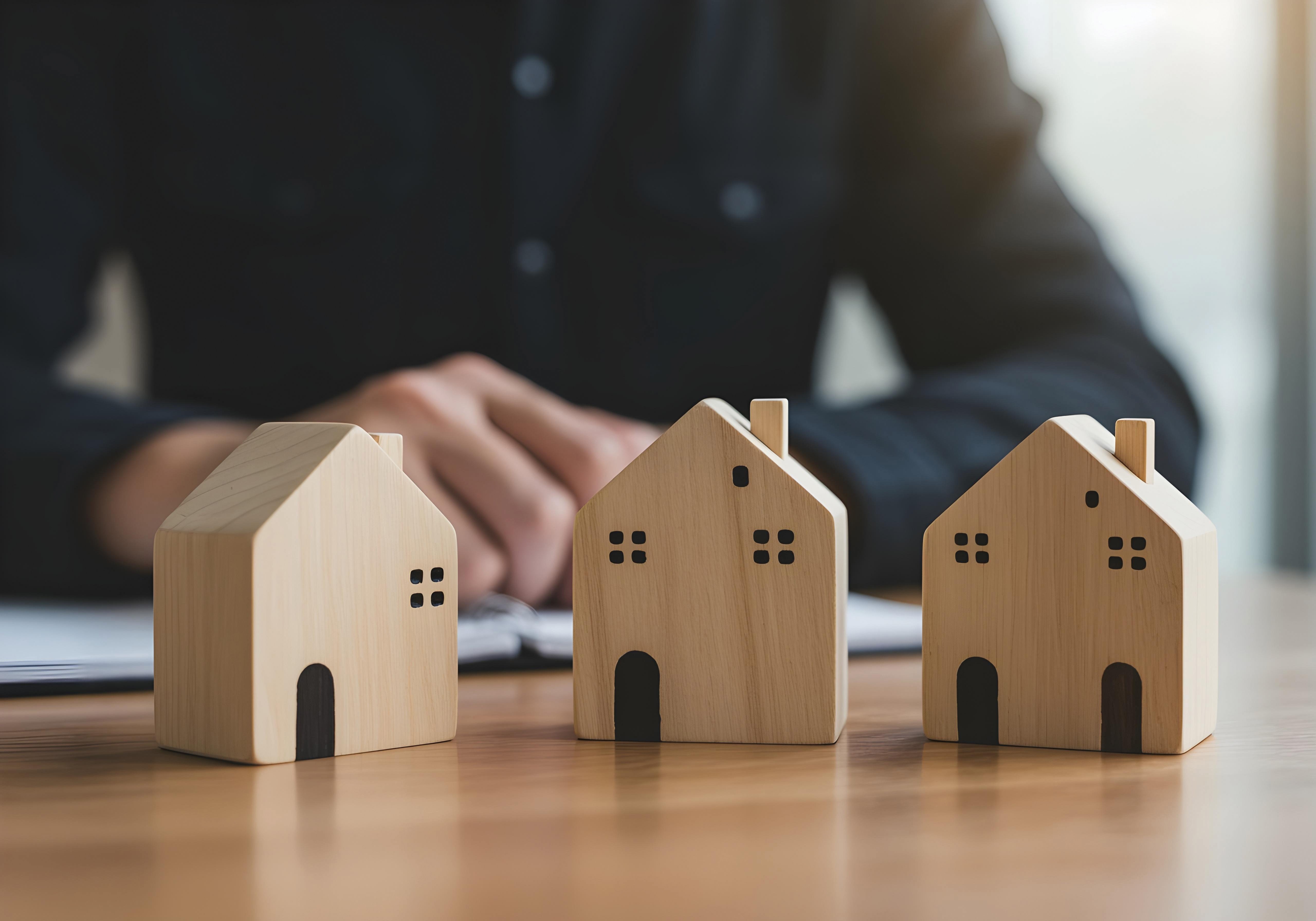 Small Wooden Homes on a Table
